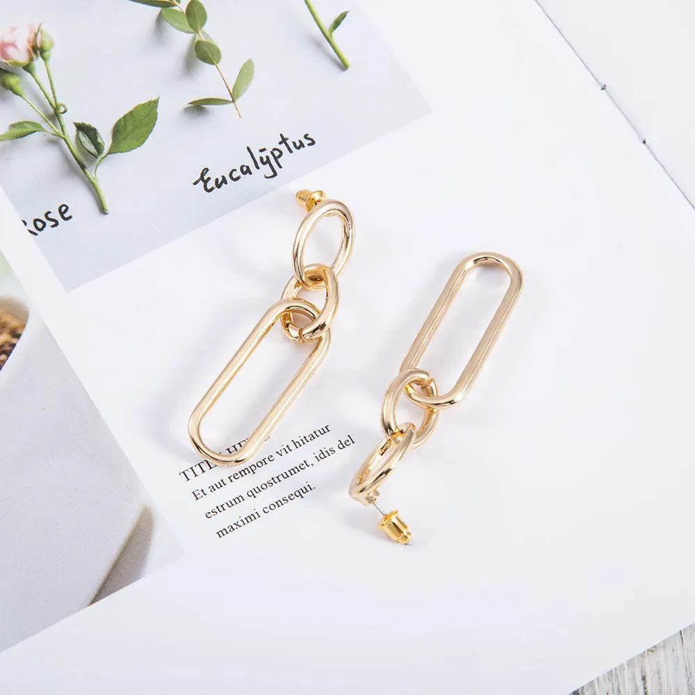 Geometric sterling silver needle colour hoop earrings for women with an alloy construction.