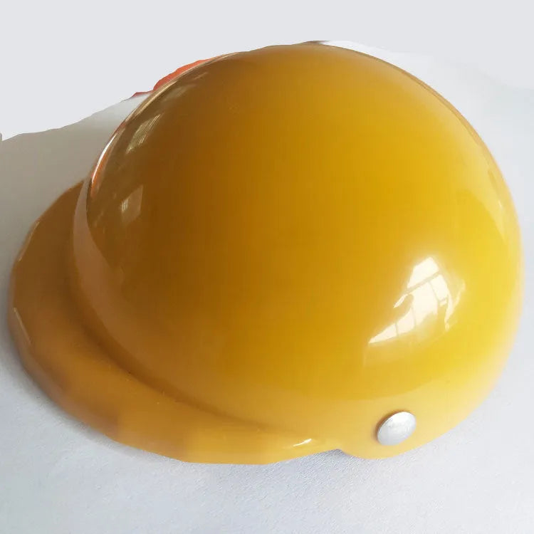 Solid colour plastic dog motorcycle helmet cap in Japanese South Korea style on a pink background.