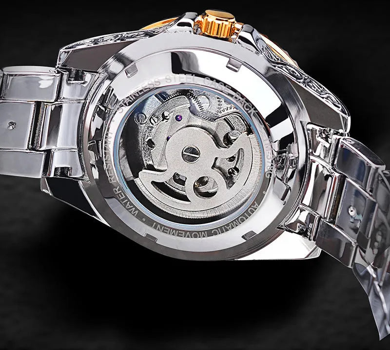 Yellow Forsining skeleton tourbillon mechanical watch with stainless steel band on wrist