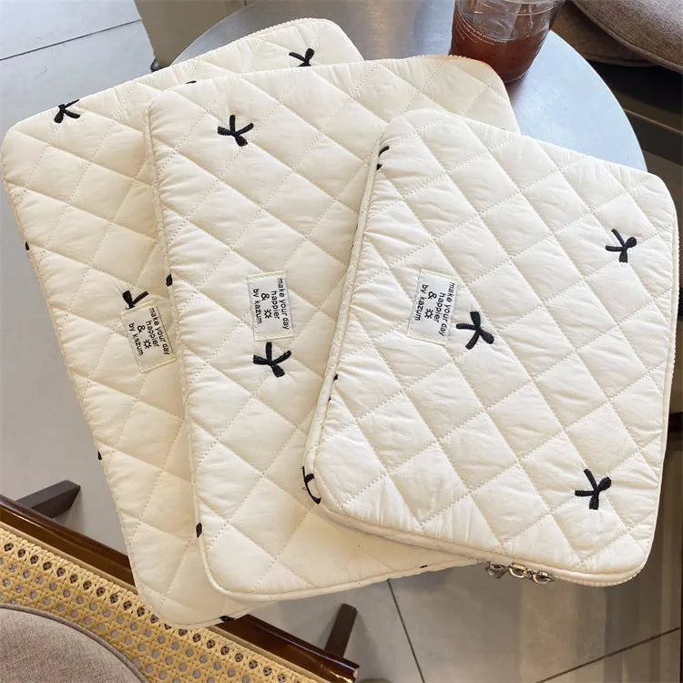 Notebook storage bag with rhombus embroidery and bow decoration in nylon fabric