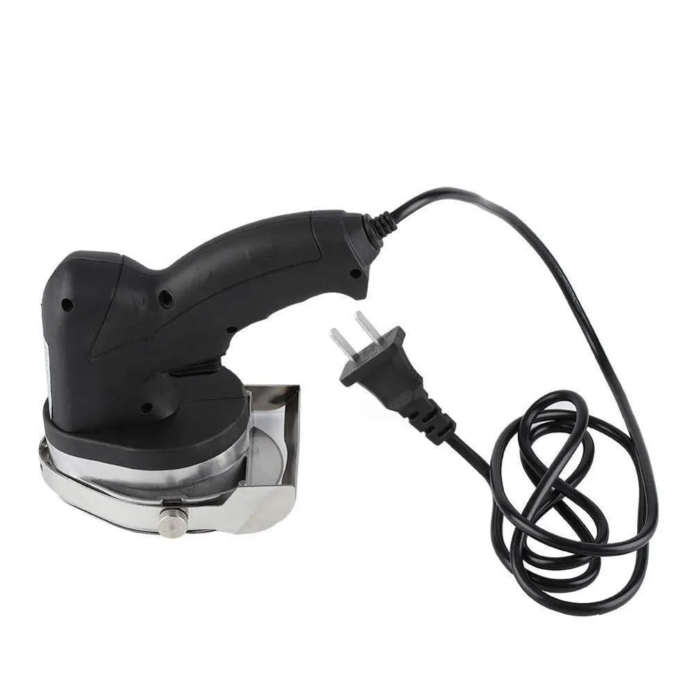 Black KS-100E electric meat cleaver with adjustable blade for turkey barbecue preparation.