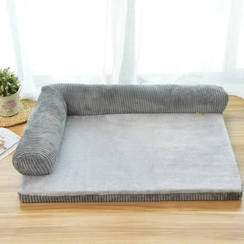 Corduroy pet sofa dog bed in grey colour with a non-slip base, shown in a medium size.