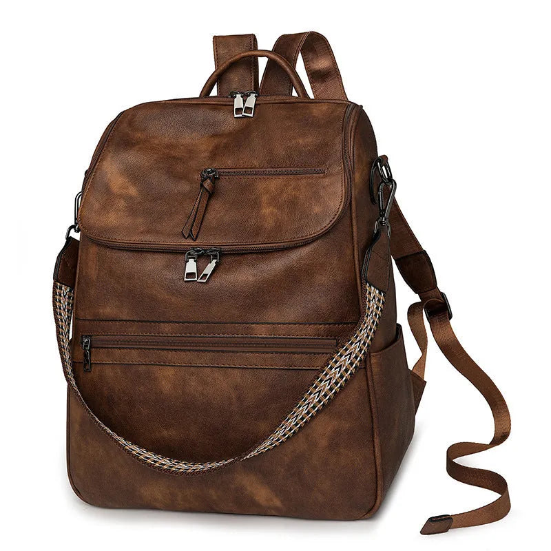 Retro college backpack with curved shoulder straps in multiple colour options including black, blue, grey, and coffee tones