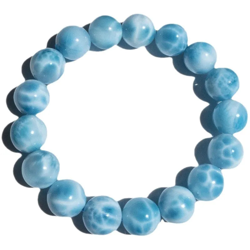 Blue bodhi bracelet with natural sea-pattern crystals and pearl accents in Maillard style