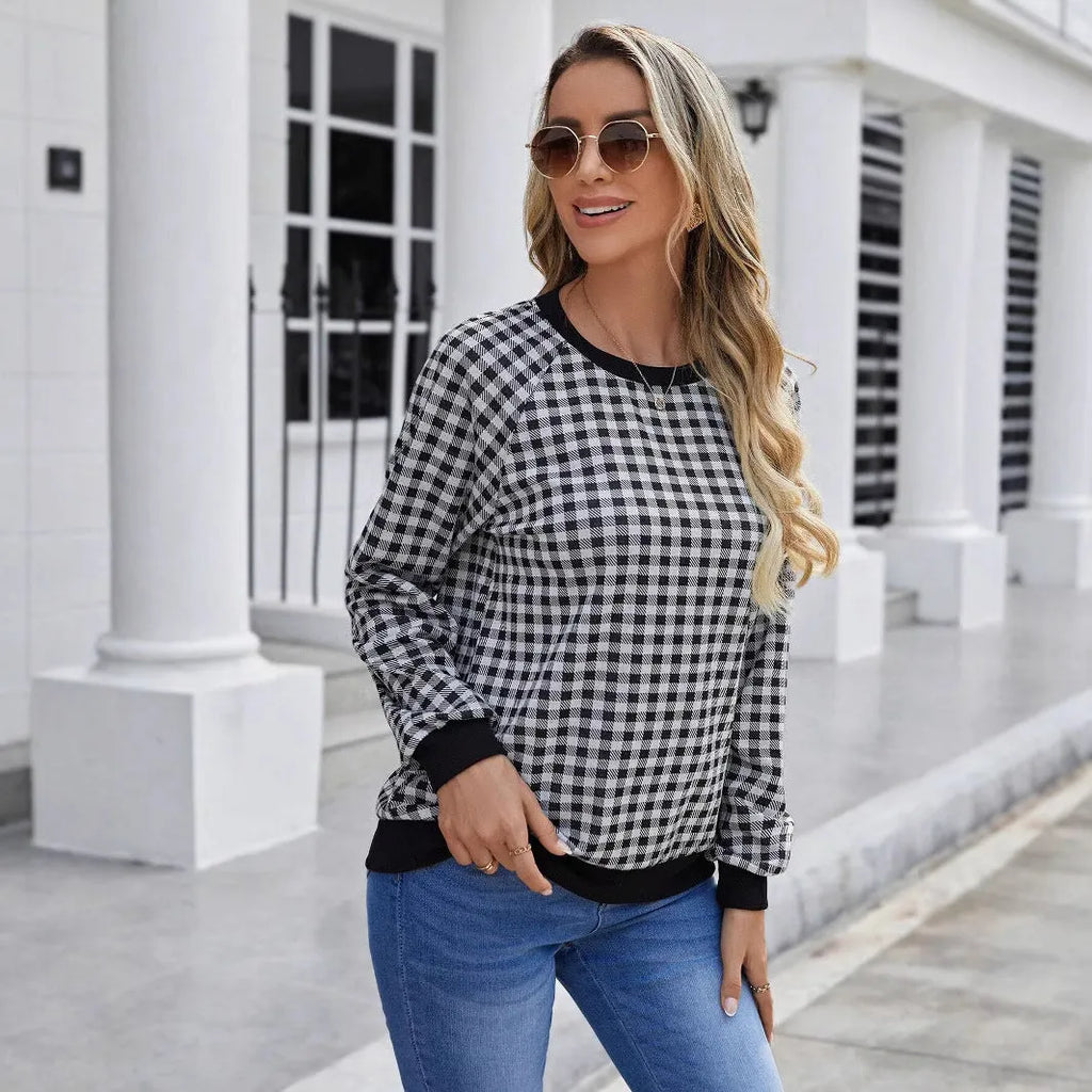 Black long sleeve pullover sweater with a Japanese sweet plaid striped pattern.
