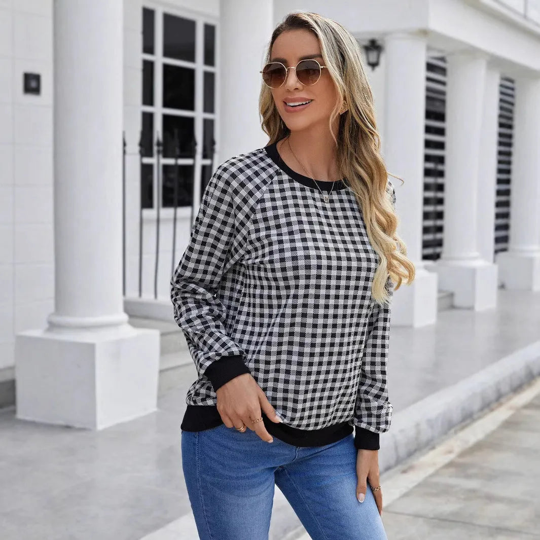 Black long sleeve pullover sweater with a Japanese sweet plaid striped pattern.