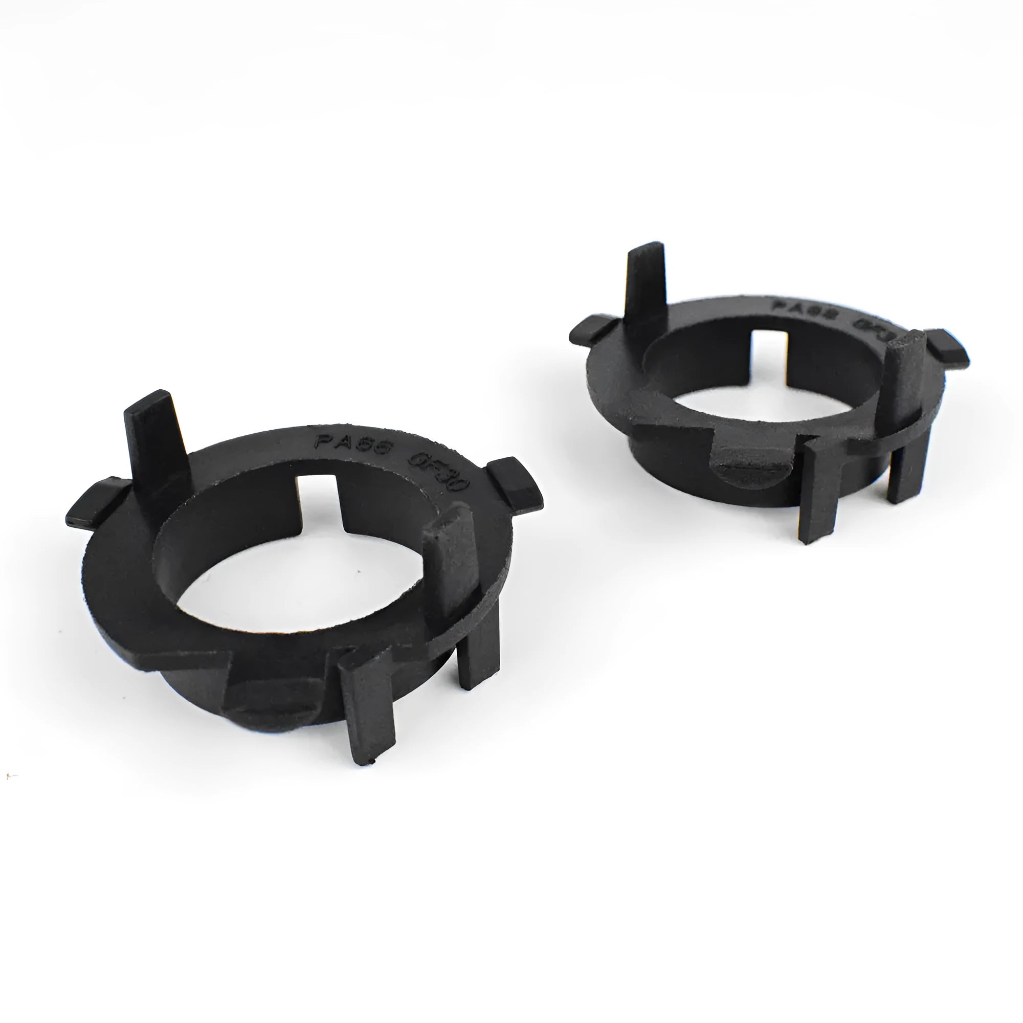 Black ABS plastic LED headlight shaped card holder for car dashboard.