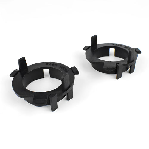 Black ABS plastic LED headlight shaped card holder for car dashboard.