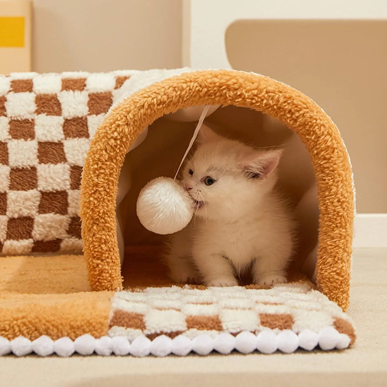 Coffee-coloured plush pet bed with integrated tunnel and anti-slip base for dogs and cats