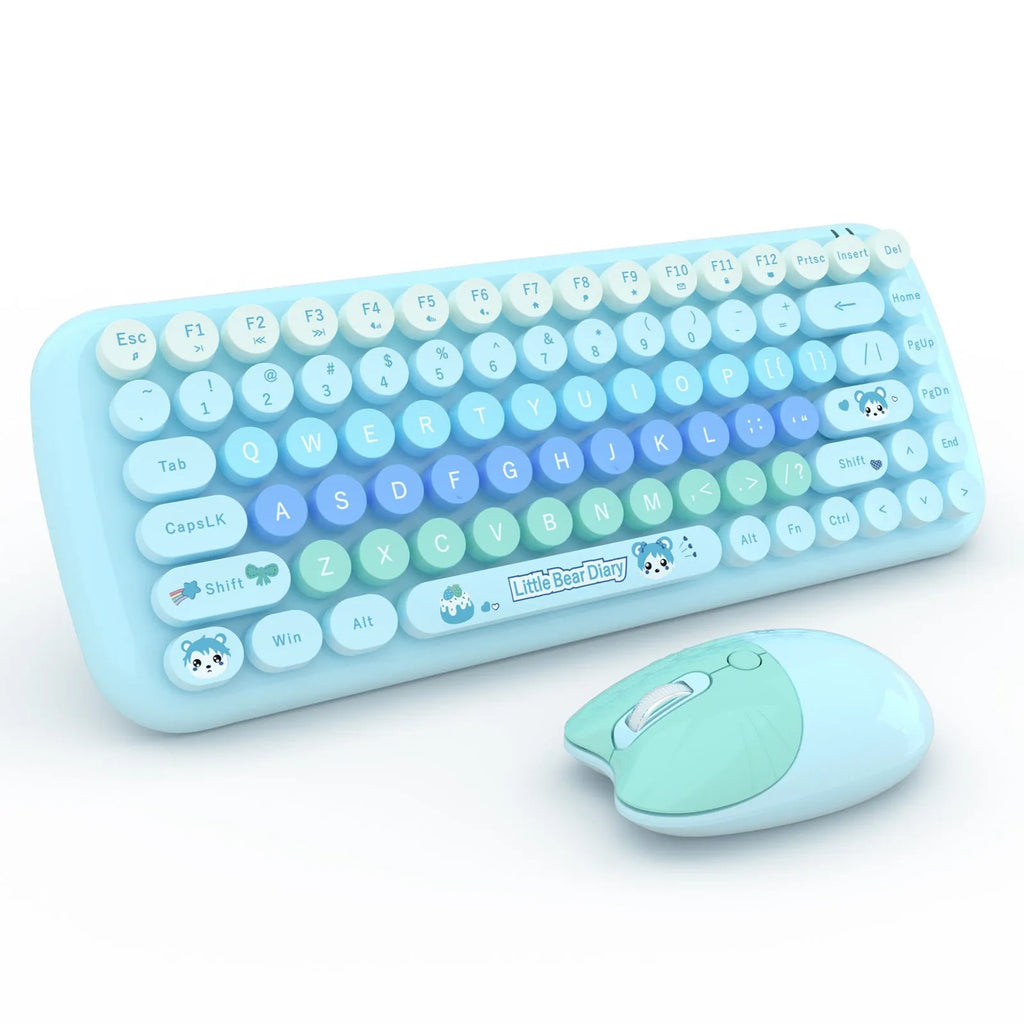 Pink mini wireless keyboard and mouse set with compact design on a desk