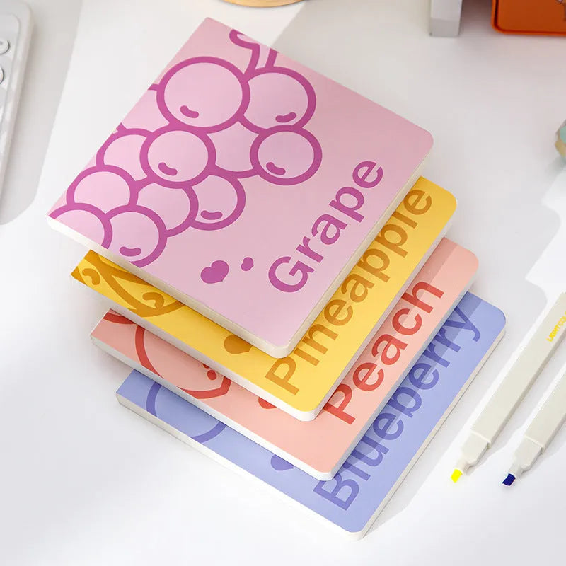 Square notebook with colour embossed fruit cover or white design, showing 14.5cm sides and 80g paper pages.
