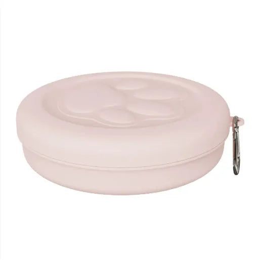 Portable dog food bowl with snack box compartment in light pink and light green colours