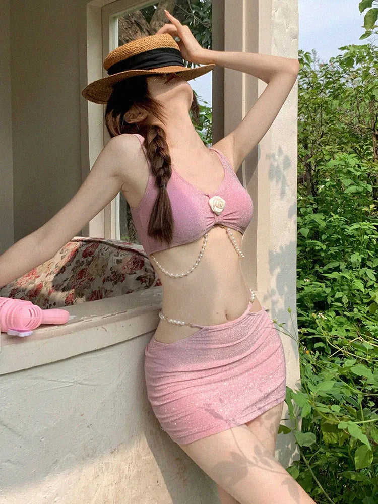 Bear Vacation pink and black three-piece polyester bikini set for swimming.