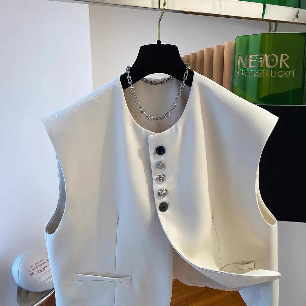 Women's loose-fitting beige polyester waistcoat vest with pockets on a hanger.