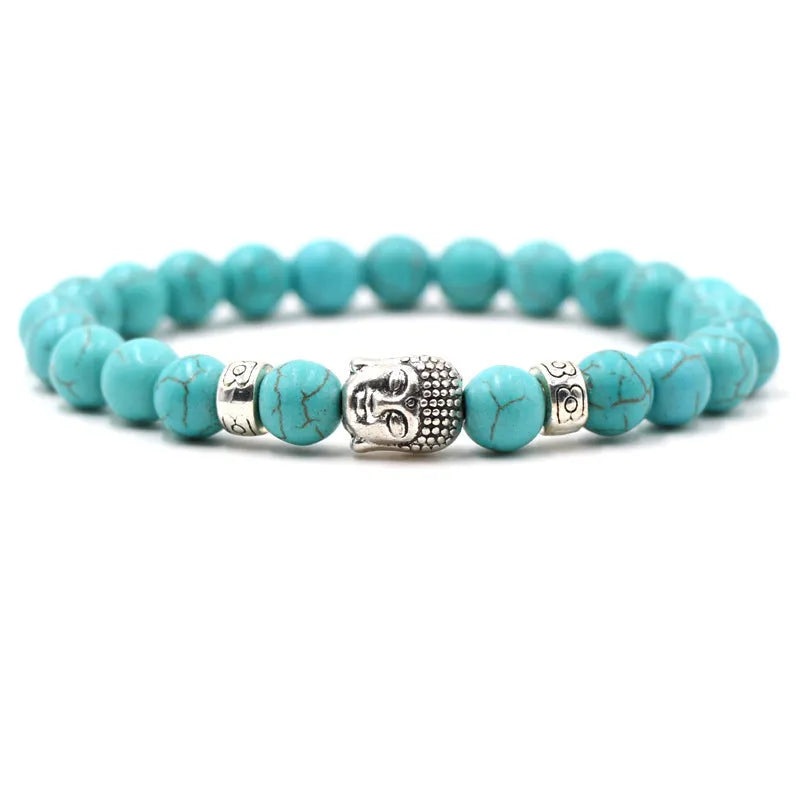 Natural stone stretch bracelet with tigereye, volcanic rock and turquoise beads on wrist