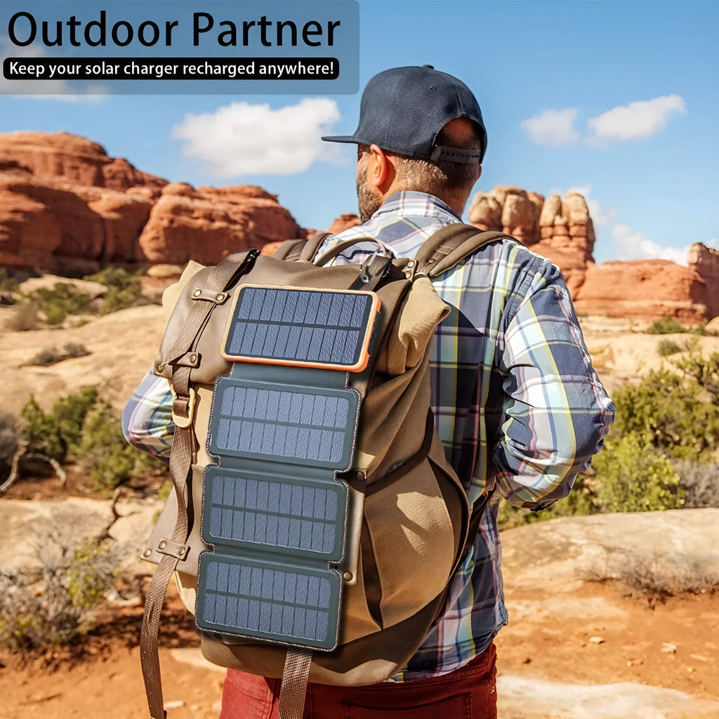 Black solar power bank with a solar panel, LED light, USB ports, and a soft leather casing.