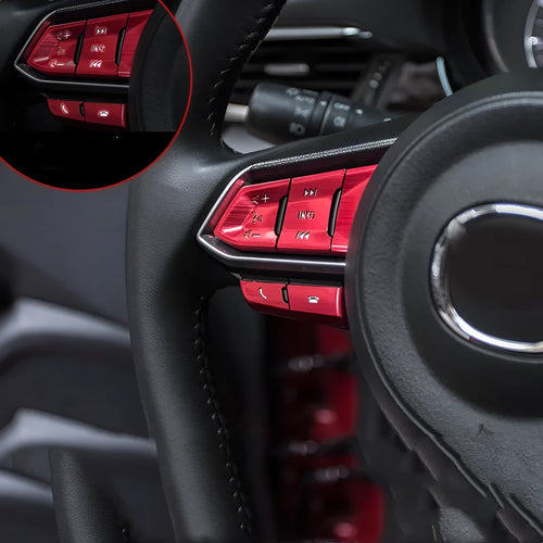 Atz modified vehicle steering wheel decorative sticker set showing aluminum alloy hollow button styles in brushed red, silver, and blue finishes