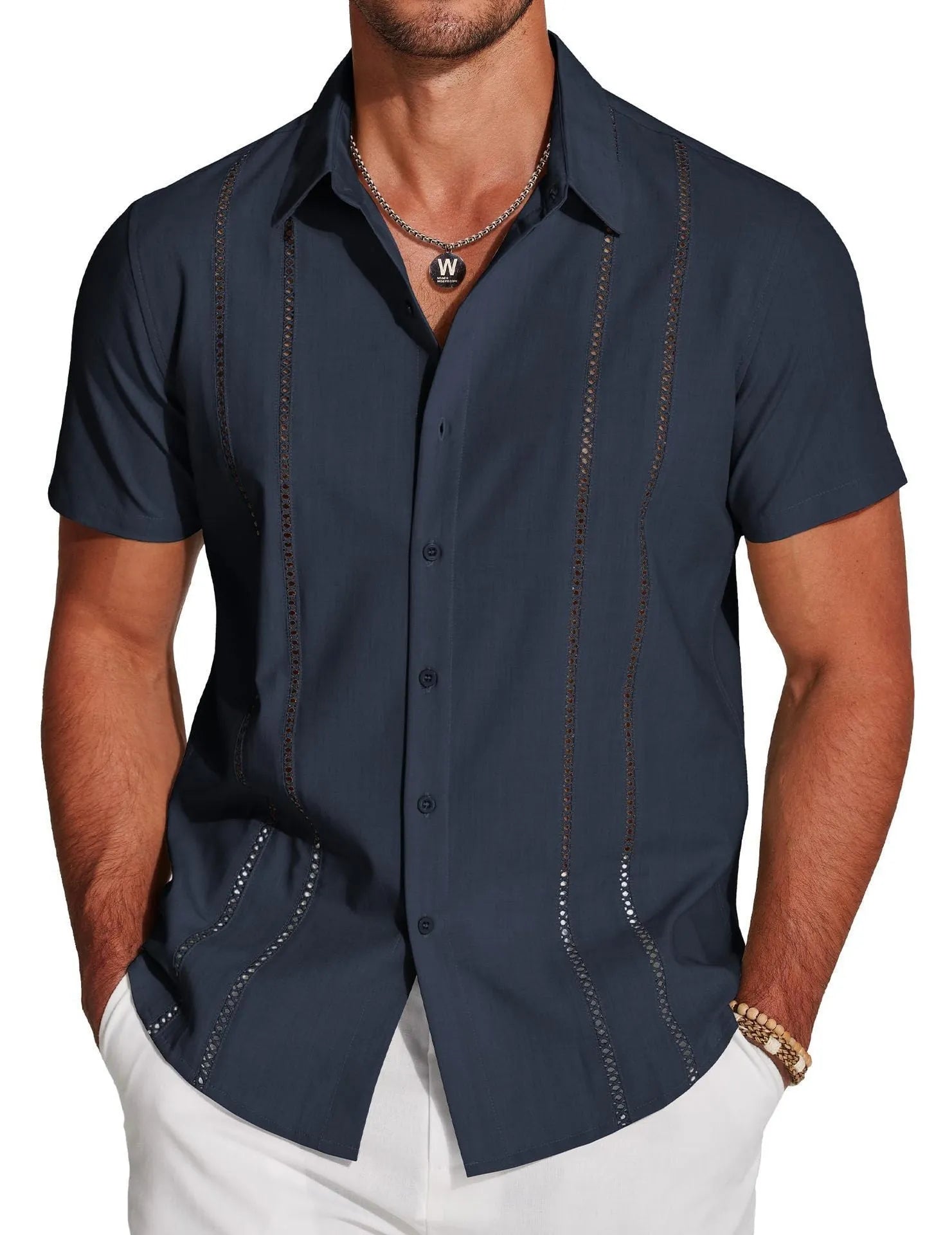 Man wearing a slim fit, short sleeve Hawaiian shirt with a digital print pattern in a casual setting.