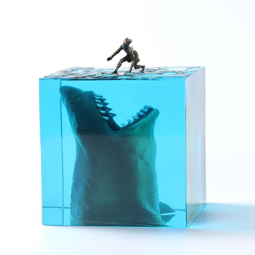 Epoxy resin shark surfer night light ornament on a desk, showing 5cm and 8cm size options.