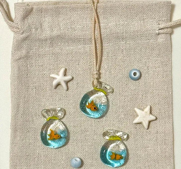 Women's coloured glaze pendant necklace with cotton linen chain featuring Skirt Everyday Joker design