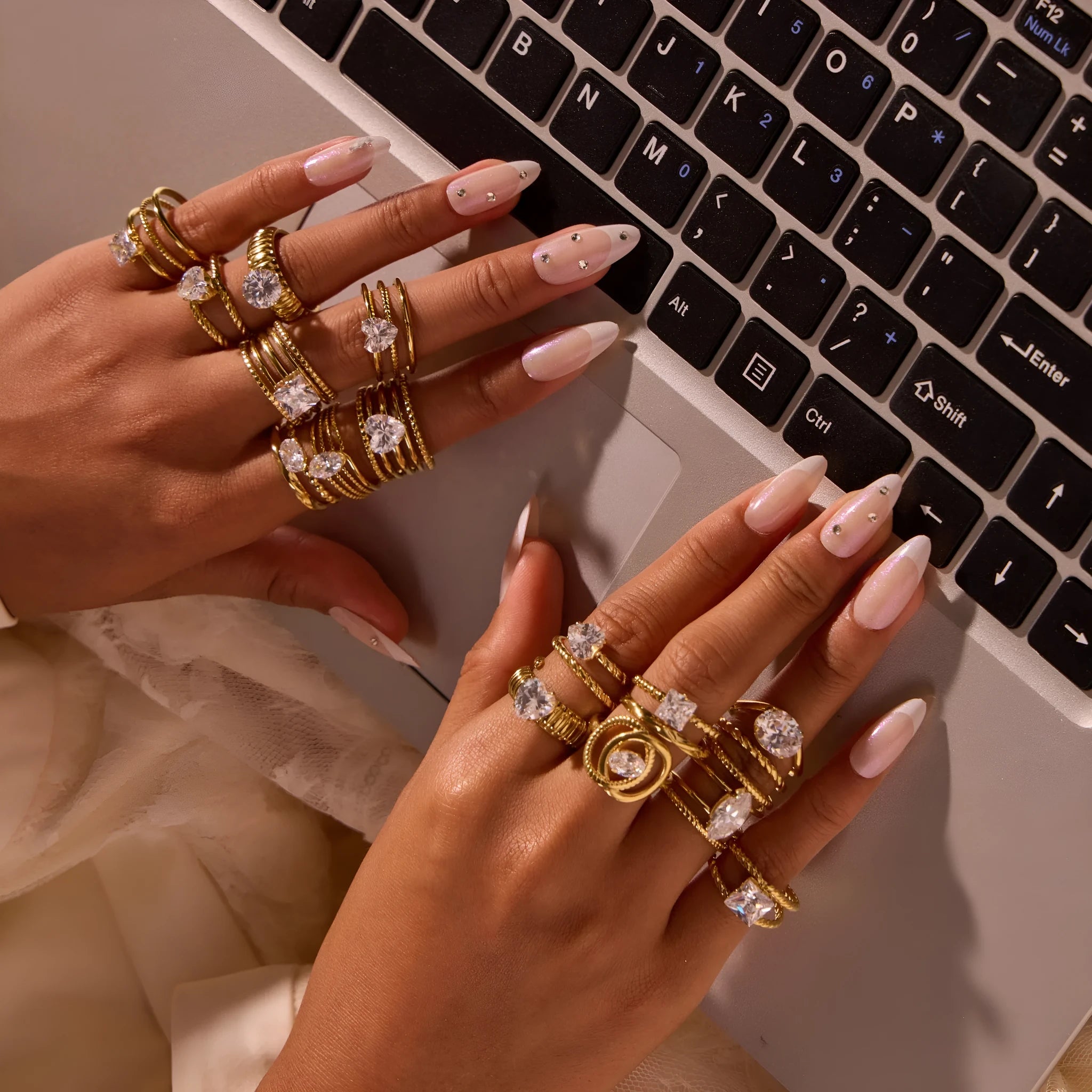 Women's geometric stainless steel ring with gold plating and inlaid zircon stones, shown in an open mouth free size design.