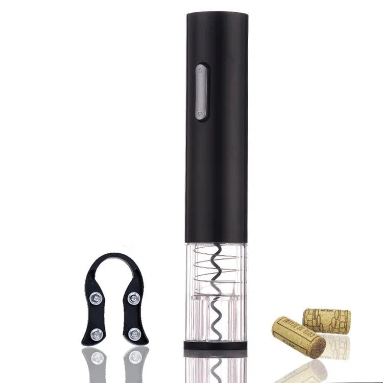 Black, red, and white electric wine bottle opener with foil cutter on a kitchen counter