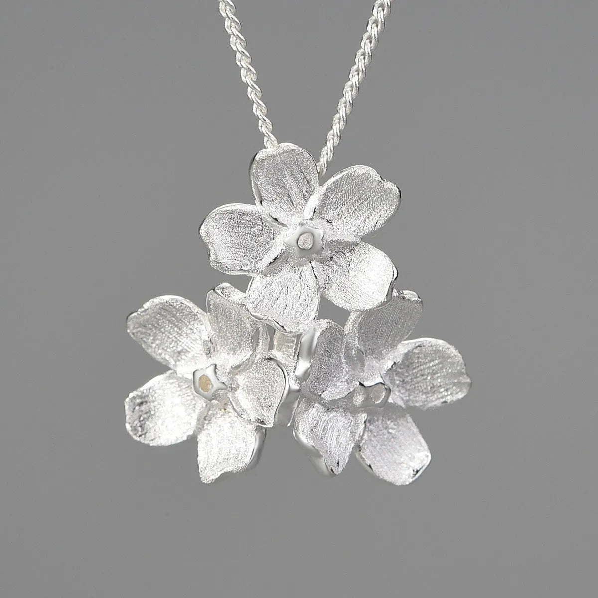 Myosotis Sylvatica sterling silver floral pendant with pastoral design in electroplated finish
