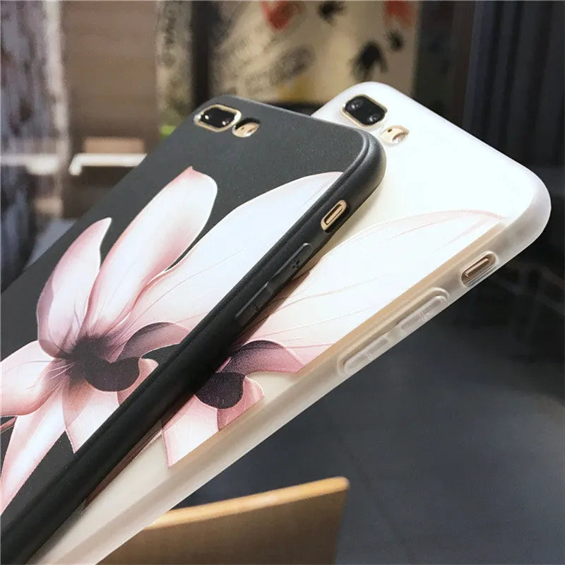 Black embossed flower design on a slim TPU iPhone case for iPhone 11.