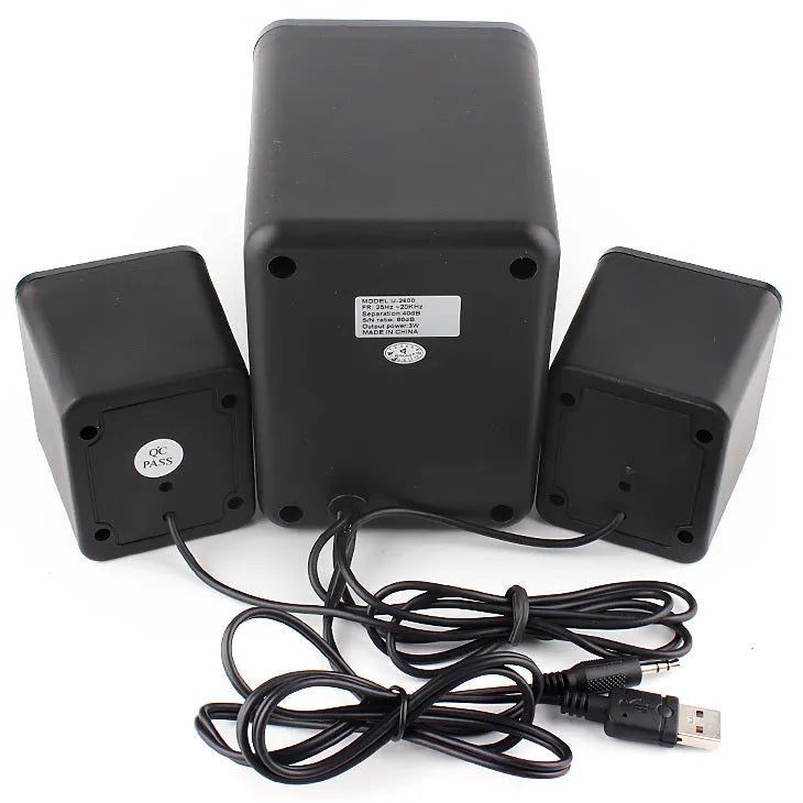 Green USB computer speaker with LED lights showing 2.1 audio system and 150 cm cable