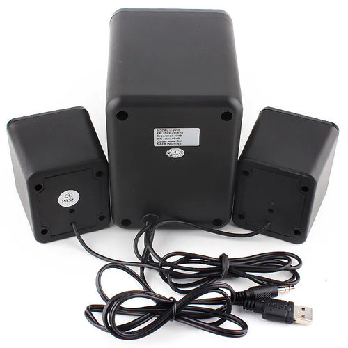 Green USB computer speaker with LED lights showing 2.1 audio system and 150 cm cable