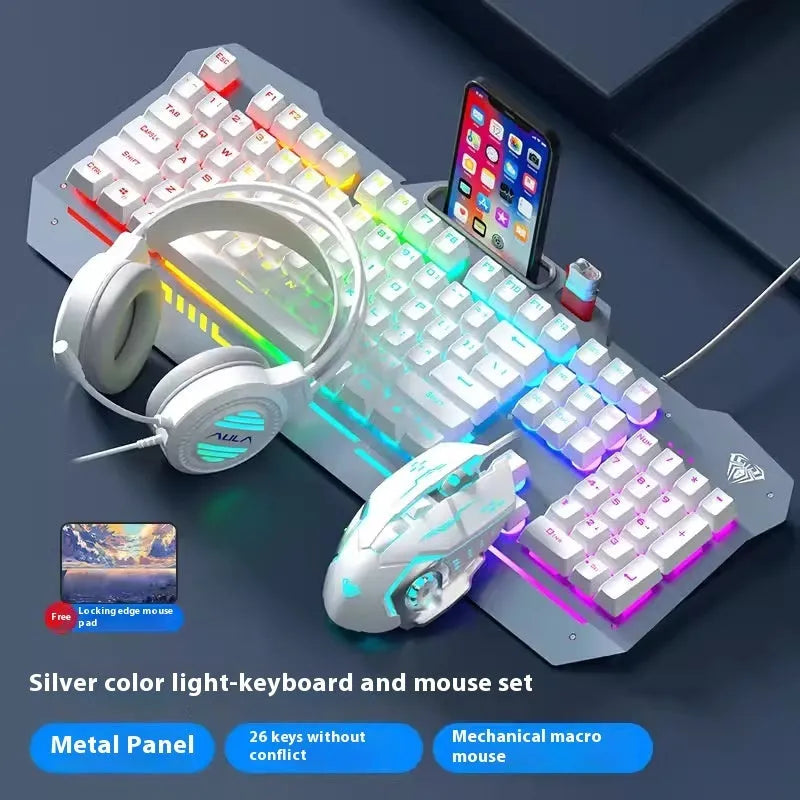 Metal mechanical keyboard bundle with gaming mouse, headset, and optional mouse pad on a desk.