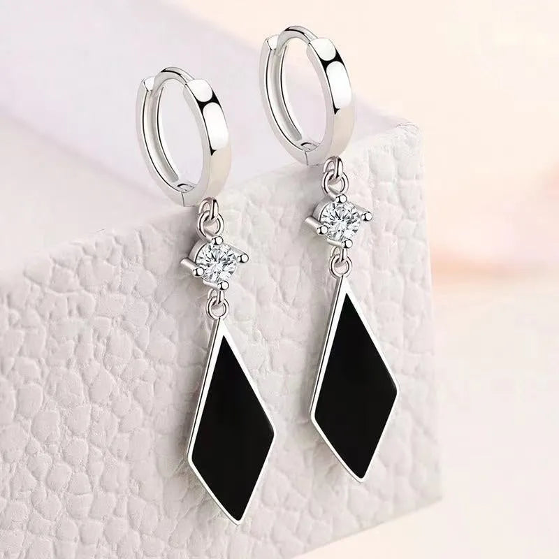 Silver geometric diamond clip earrings with 0.3 cm measurement and electroplated zinc alloy construction