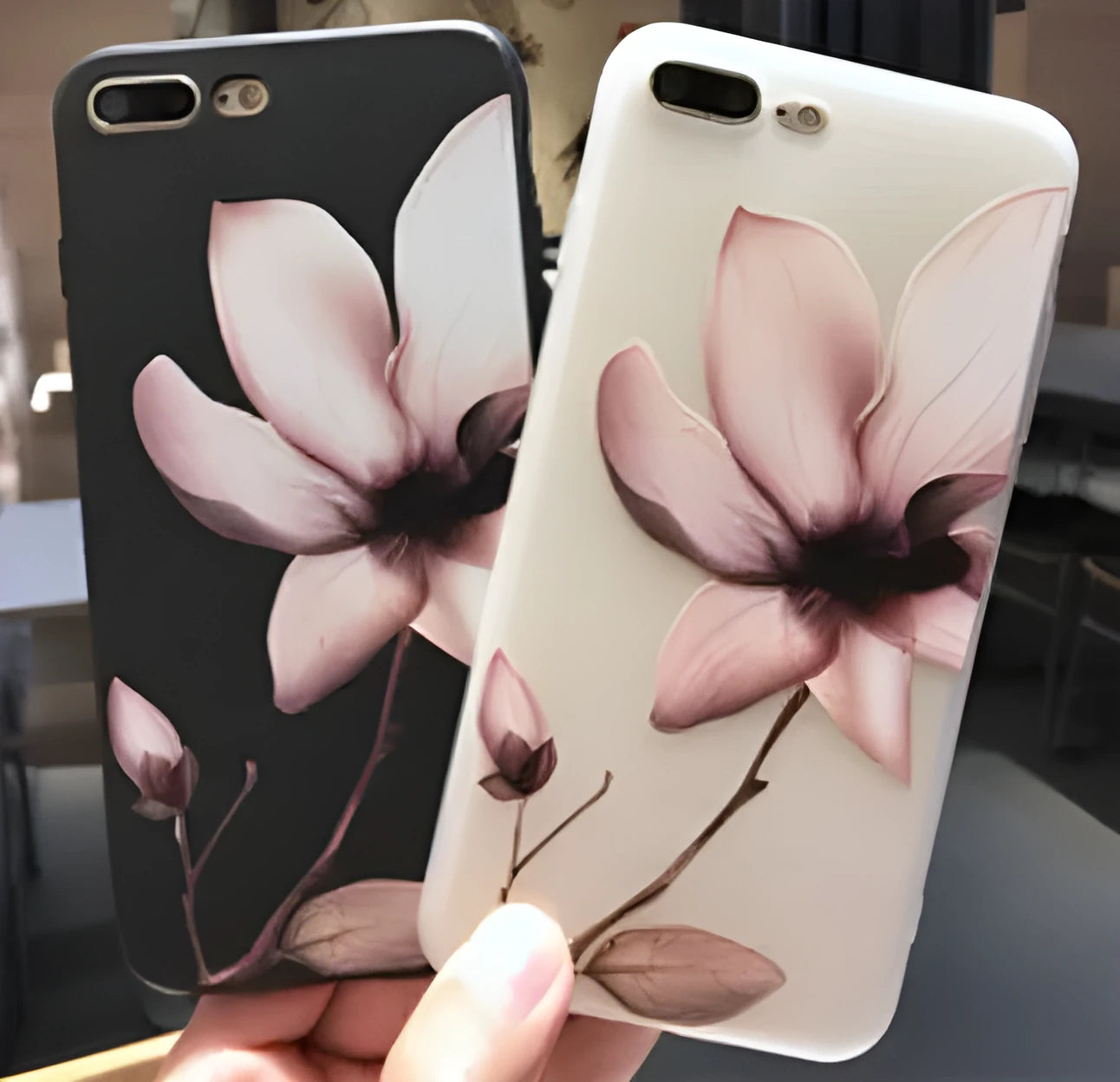 Black embossed flower design on a slim TPU iPhone case for iPhone 11.