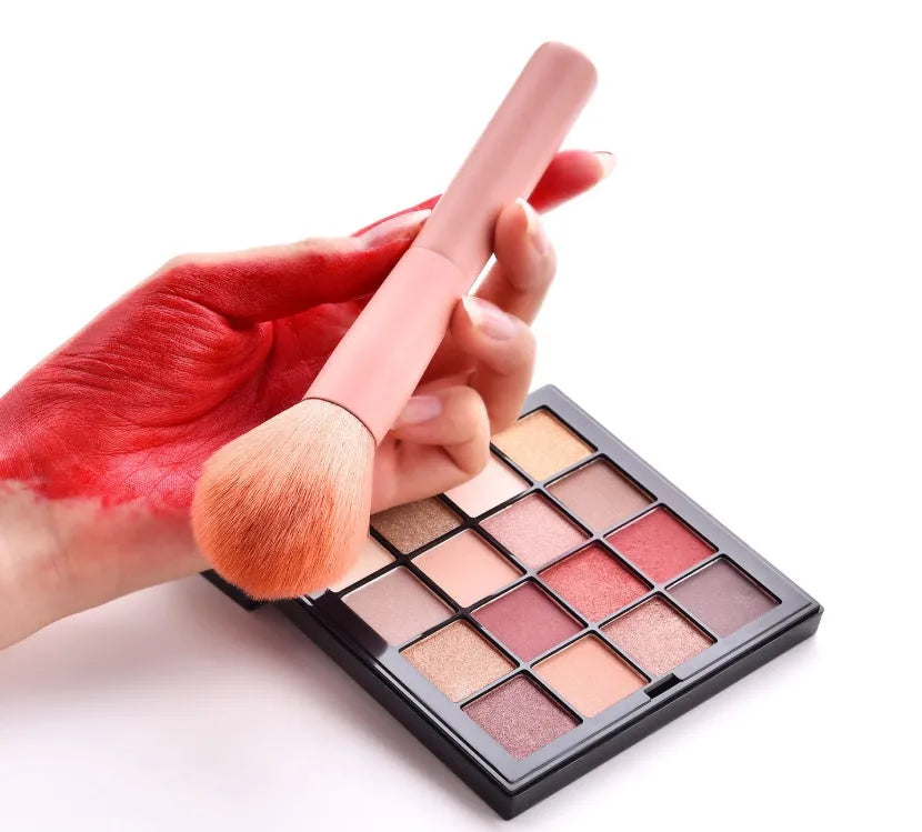 10-piece wooden handle makeup brush set with nylon bristles in a storage case.