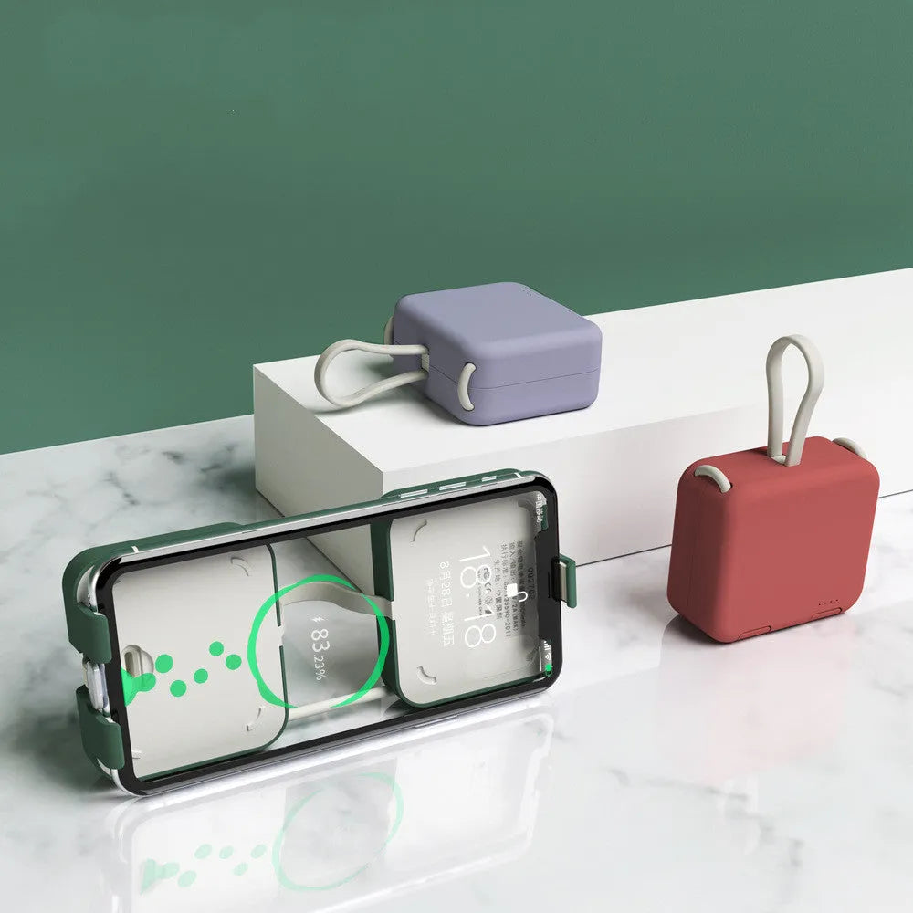 Handbag back clip power bank in blue showing USB-A and Type-C ports and integrated phone stand function.