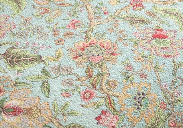Blue American floral and bird quilted cotton bedspread set with three pieces for a double bed