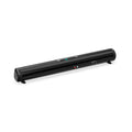 Tall black Bluetooth sound bar speaker with remote control on a wooden surface