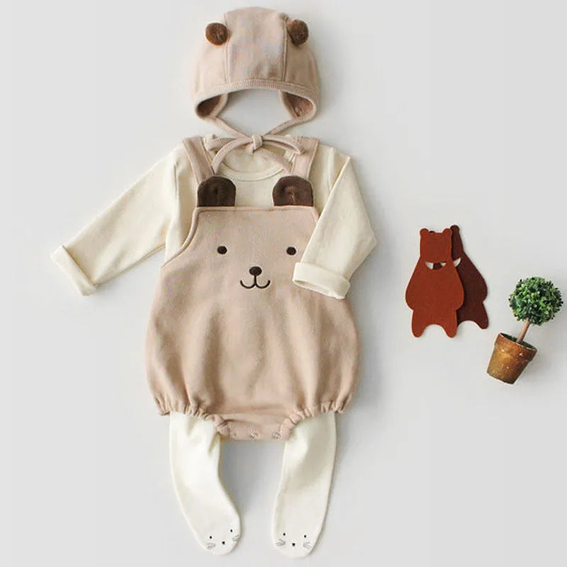 Baby sleeveless cotton robe with detachable hood in white on a soft background