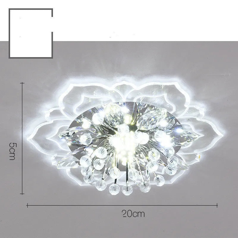Small modern crystal ceiling lamp with flower-shaped shade in crystal, acrylic, and stainless steel materials
