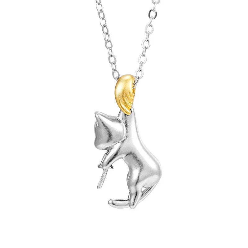 Sterling silver clavicle necklace with cat pendant on model, showing electroplated finish and professional styling