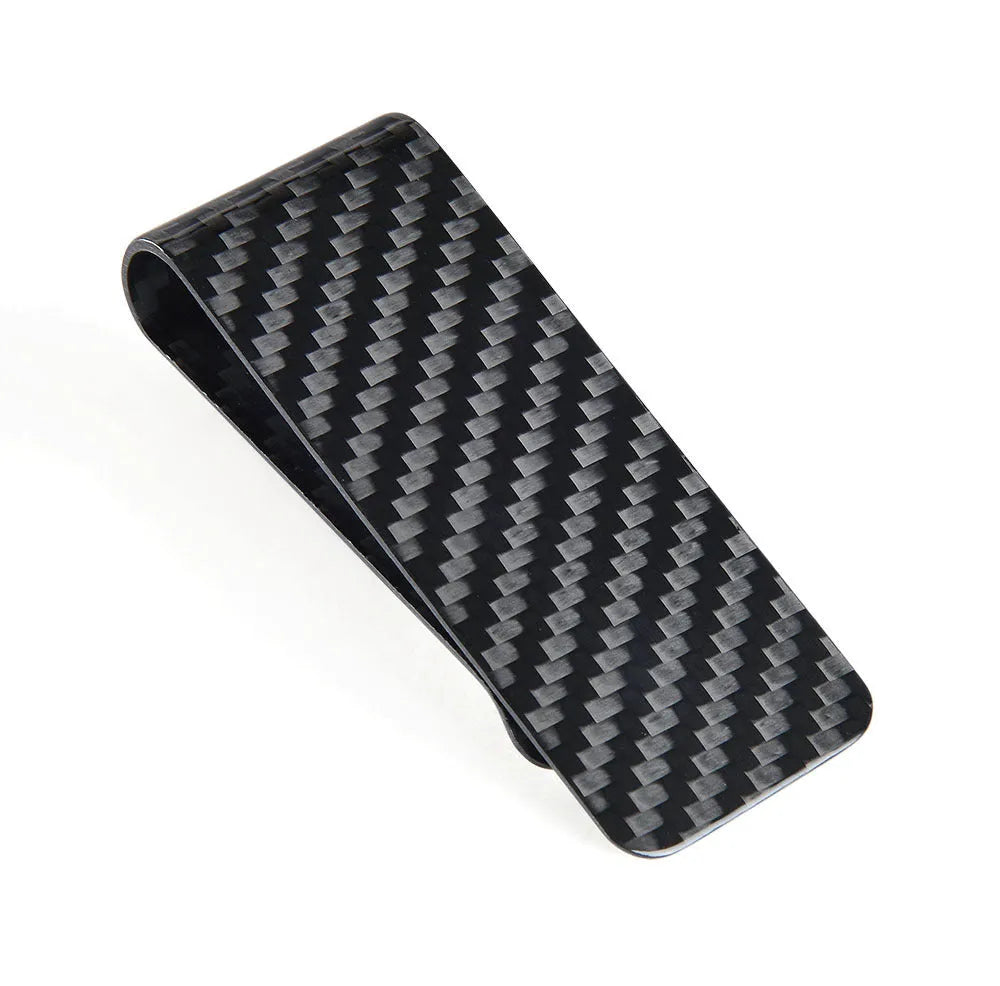 Glossy black carbon fibre money clip with striped pattern on white background