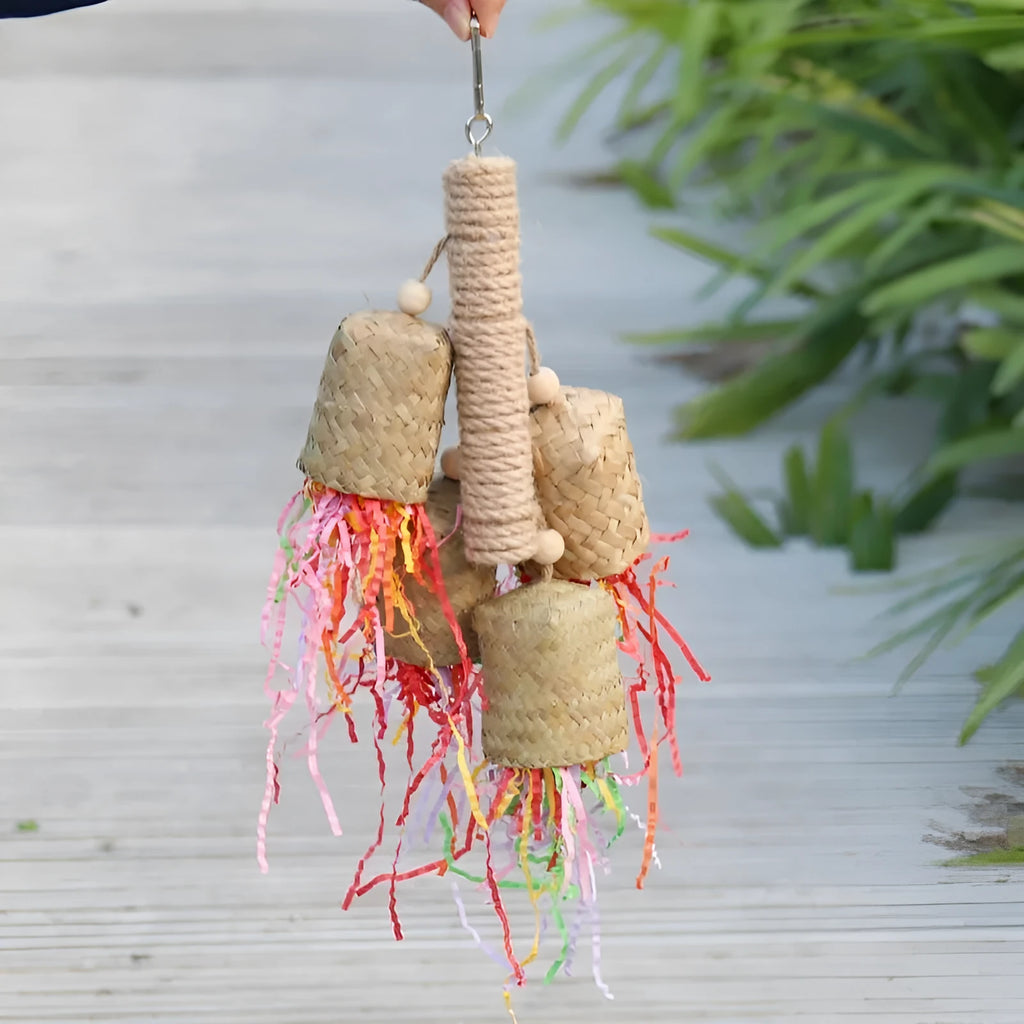 Wooden frame parrot toy with sisal rope and colourful shredded paper strips measuring 15cm by 35cm