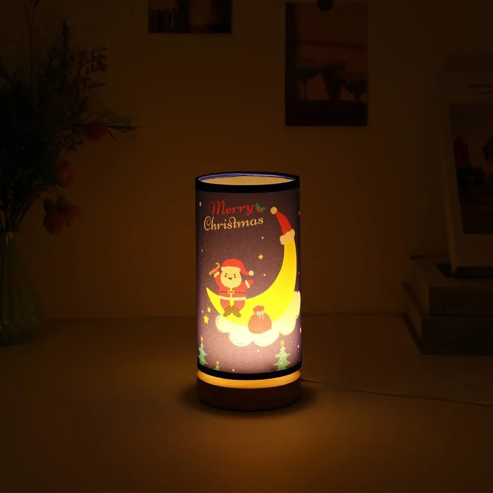 Santa Claus silhouette on a moon-shaped USB LED night light with a bamboo base.