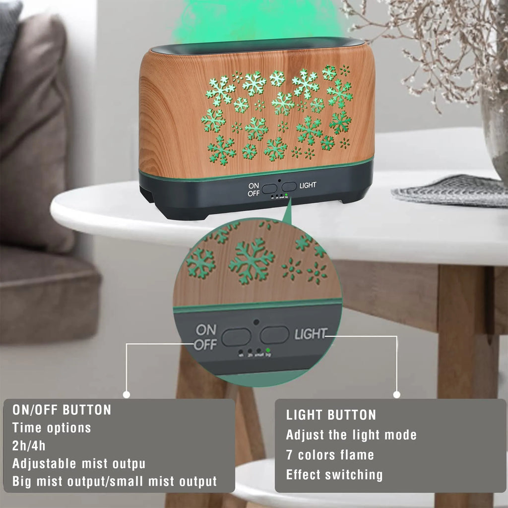 Christmas snowflake pattern humidifier with colourful flame effects and remote control on wooden desk