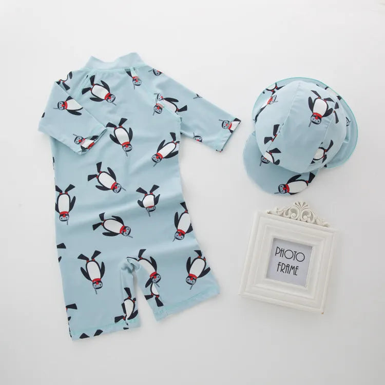 Boys' penguin pattern swimsuit set with long sleeves and matching swimming cap