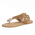 Women's black rhinestone flip-toe sandals with slip-on design and flat rubber sole