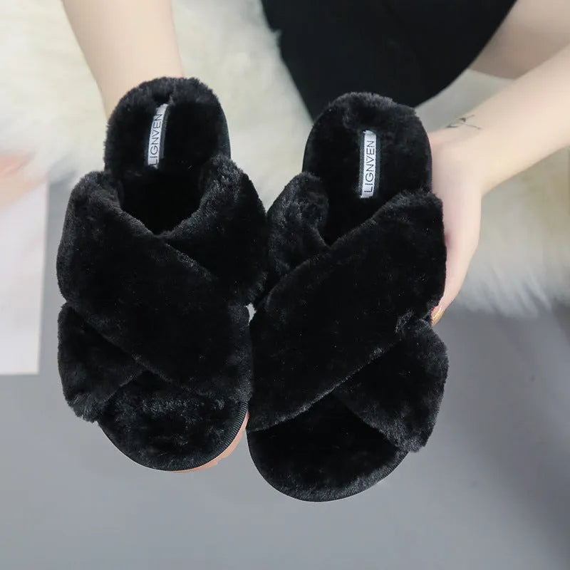 Cross open-toe fur slippers in pink with a patterned non-slip sole.