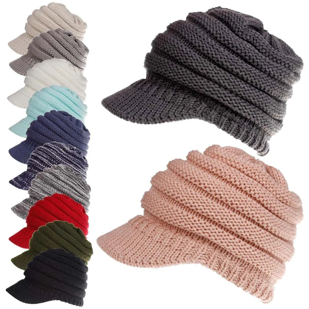 Women's knitted ponytail beanie with hair hole opening in acrylic yarn, shown in beige colour