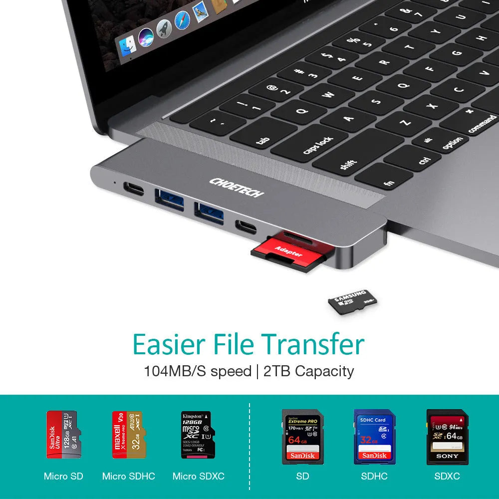 Silver aluminium USB-C 7-in-1 adapter hub with SD card slot, Micro SD slot, HDMI, USB 3.0, and USB-C ports