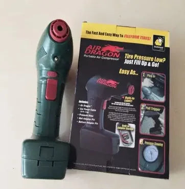 Compact black 12V portable car tyre inflator with motor and air hose for emergency use.